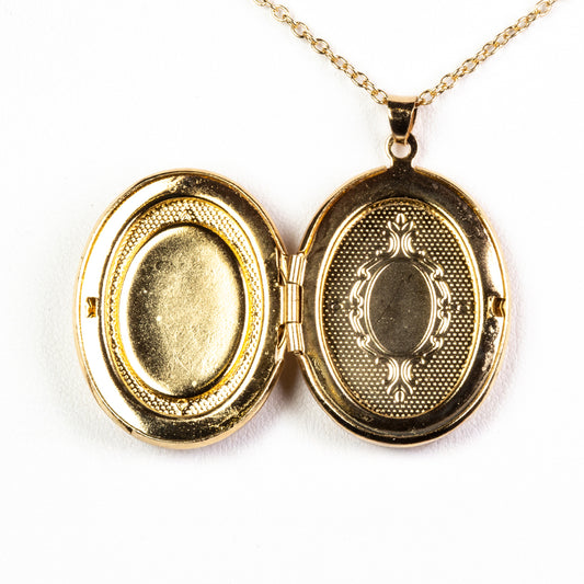 Naszyjnik z medalionem przedstawiającym anioła opiekuńczego