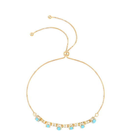 Bransoletka srebrna pozłacana z niebieskim turkusem i białym topazem