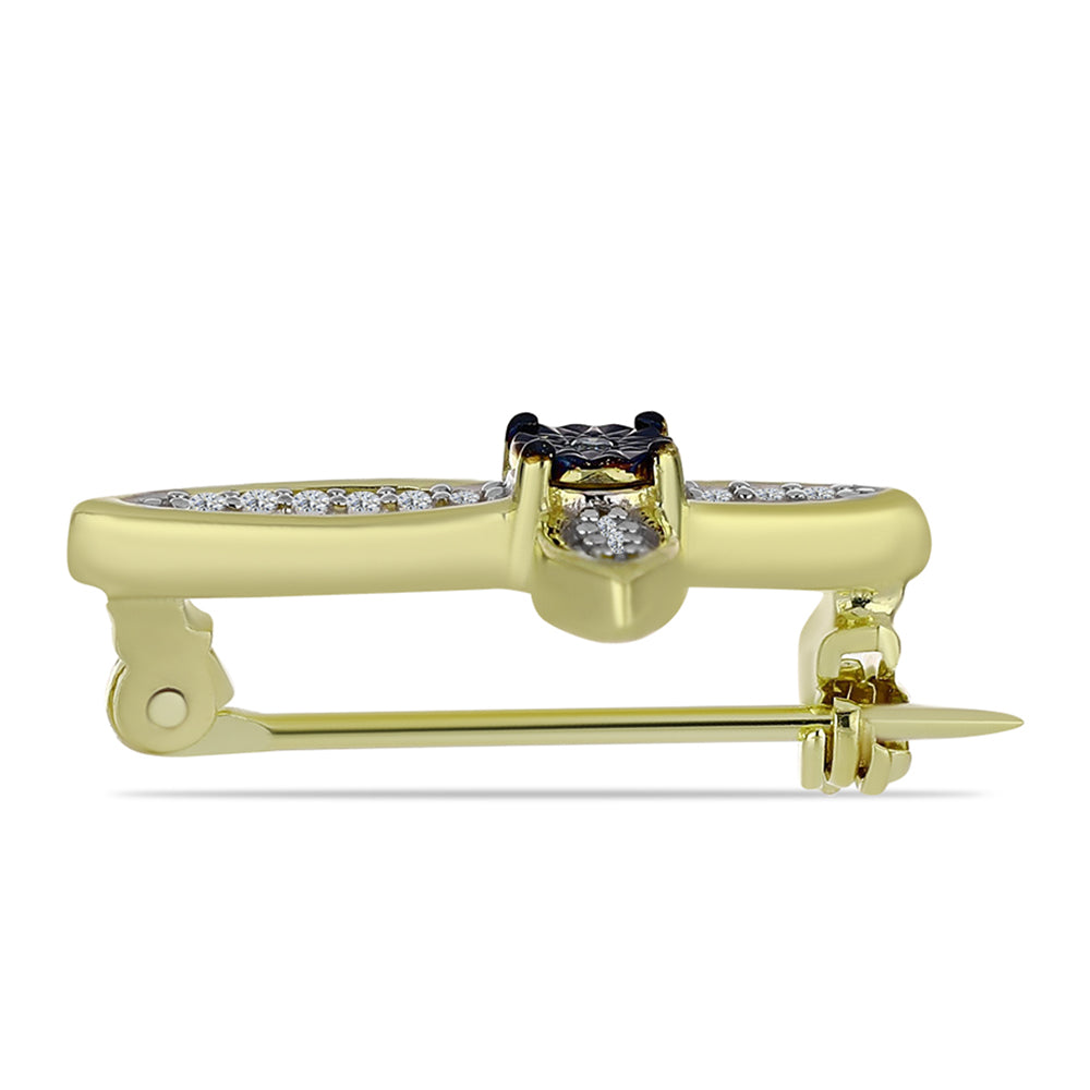 Broszka srebrny pozłacany z niebieskim diamentem i białym topazem