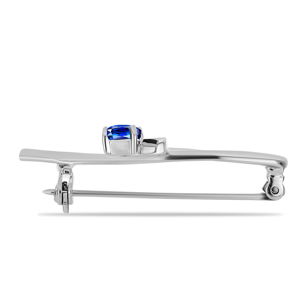 Broszka ze srebra próby 925 z australijskim niebieskim szafirem i białym topazem