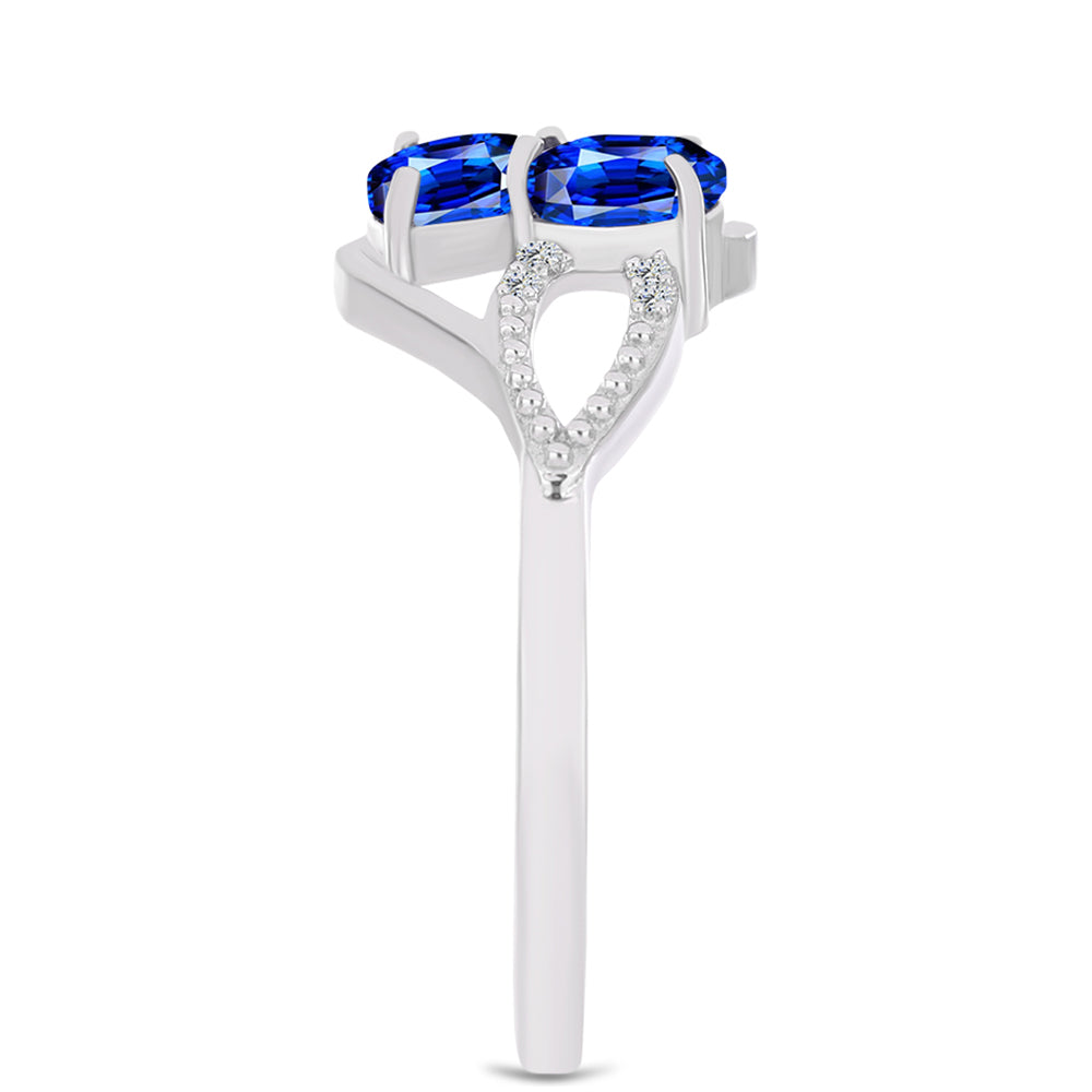 Pierścionek ze srebra próby 925 z australijskim niebieskim szafirem i białym topazem