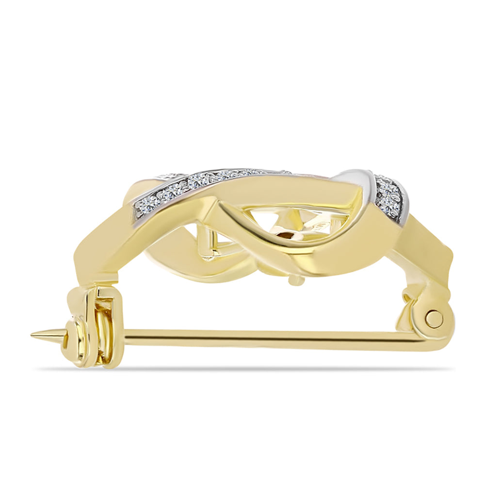 Broszka srebrny pozłacany z koniakowym diamentem i białym topazem