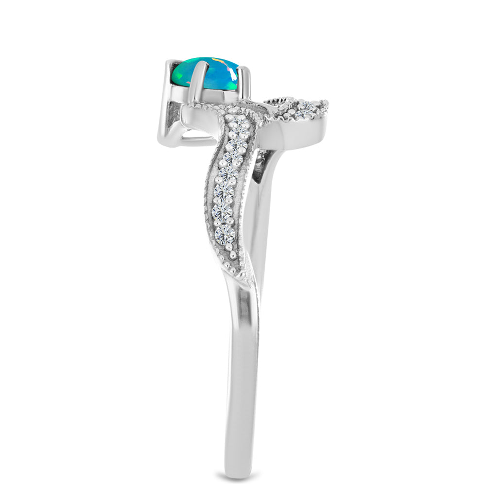 Pierścionek ze srebra próby 925 z niebieskim etiopskim opalem i białym cyrkonem