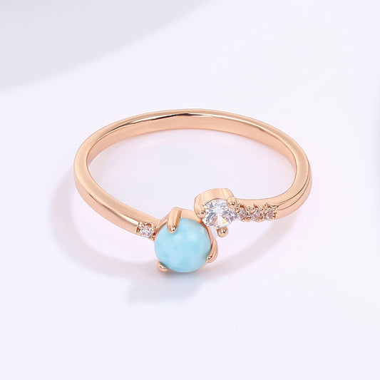 Pierścionek pozłacany z niebieskim kryształem emporia® i białym kryształem emporia®