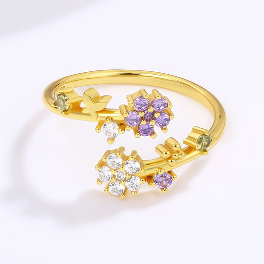 Pierścionek pozłacany z białym kryształem emporia® i purpurowym kryształem emporia®