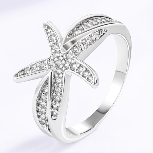 Pierścionek pozłacany z białym kryształem emporia®