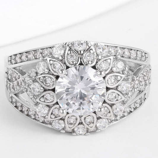 Pierścionek pozłacany z białym kryształem emporia®