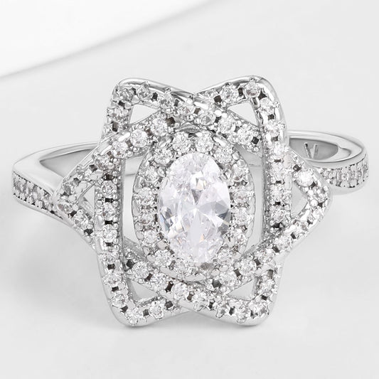 Pierścionek pozłacany z białym kryształem emporia®