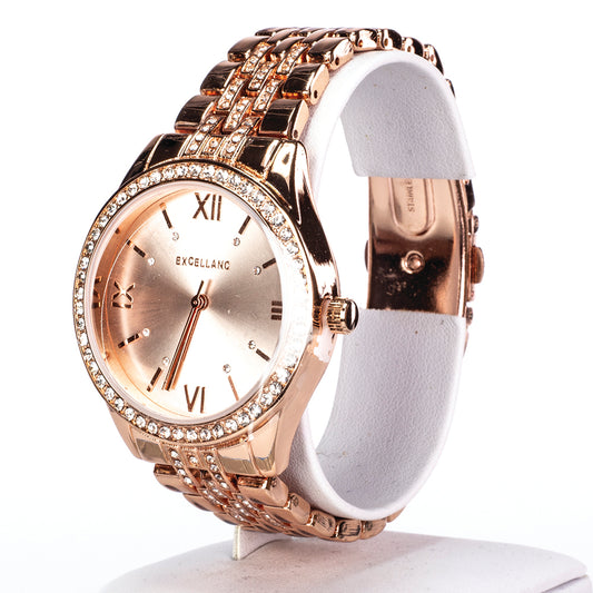 Damski zegarek Excellanc w kolorze różowego złota z metalową bransoletą, składanym zapięciem i kryształkami