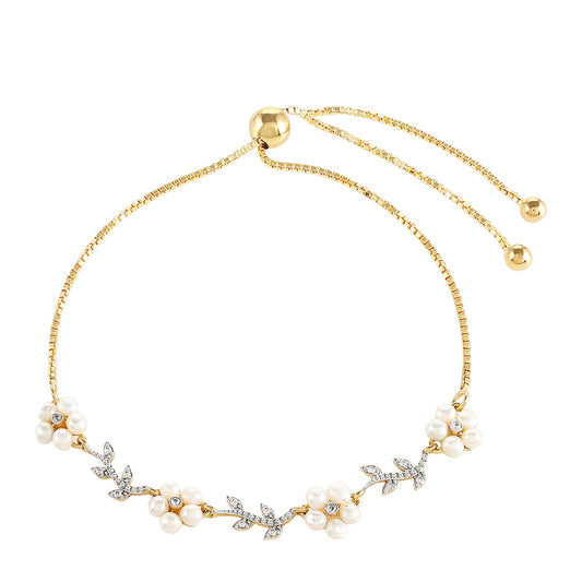 Bransoletka srebrna pozłacana z perłami hodowlanymi słodkowodnymi i białym topazem