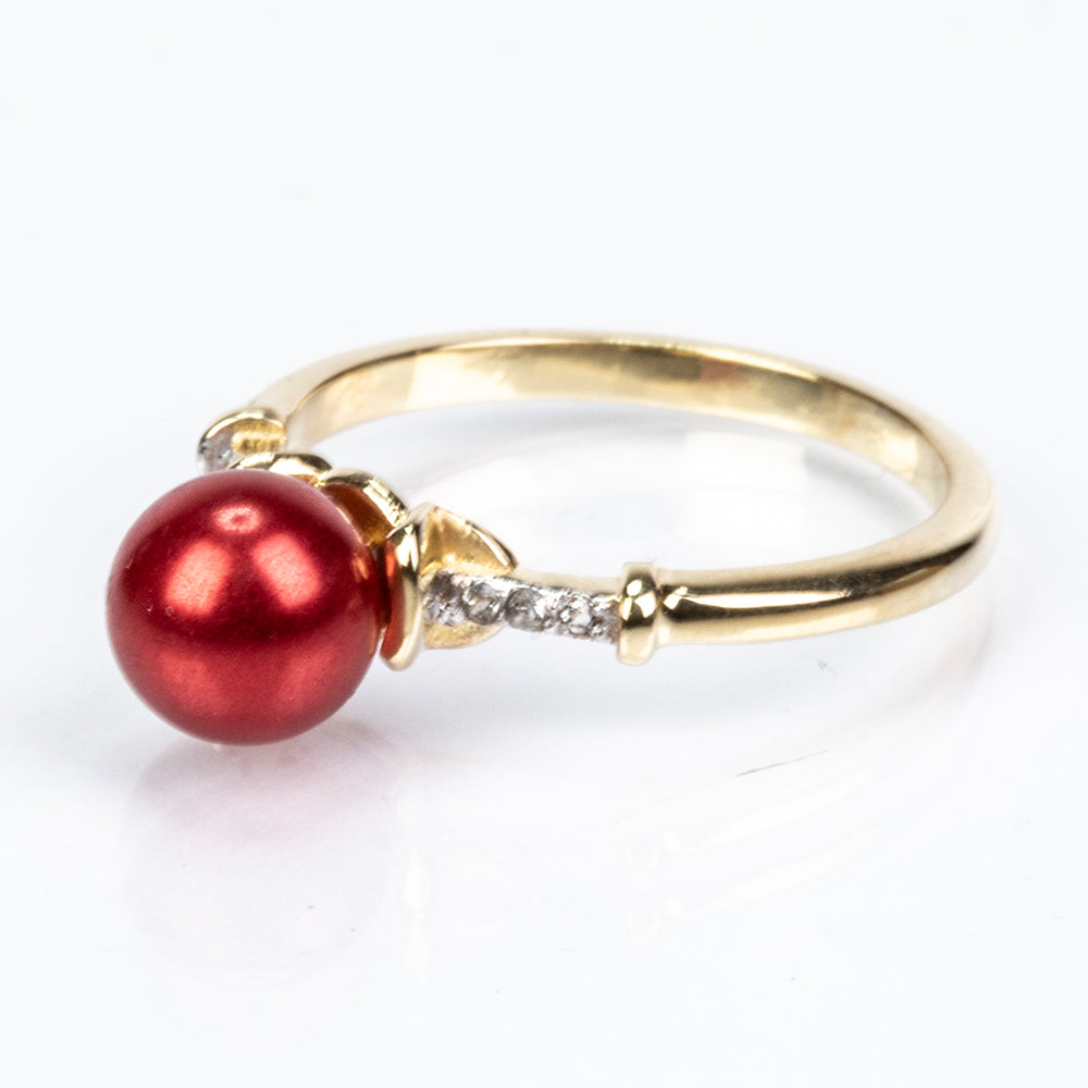 Pierścionek srebrny pozłacany z czerwoną perłą słodkowodną i białym topazem