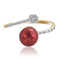 Pierścionek srebrny pozłacany z czerwoną perłą słodkowodną i białym topazem