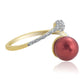 Pierścionek srebrny pozłacany z czerwoną perłą słodkowodną i białym topazem