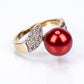 Pierścionek srebrny pozłacany z czerwoną perłą słodkowodną i białym topazem