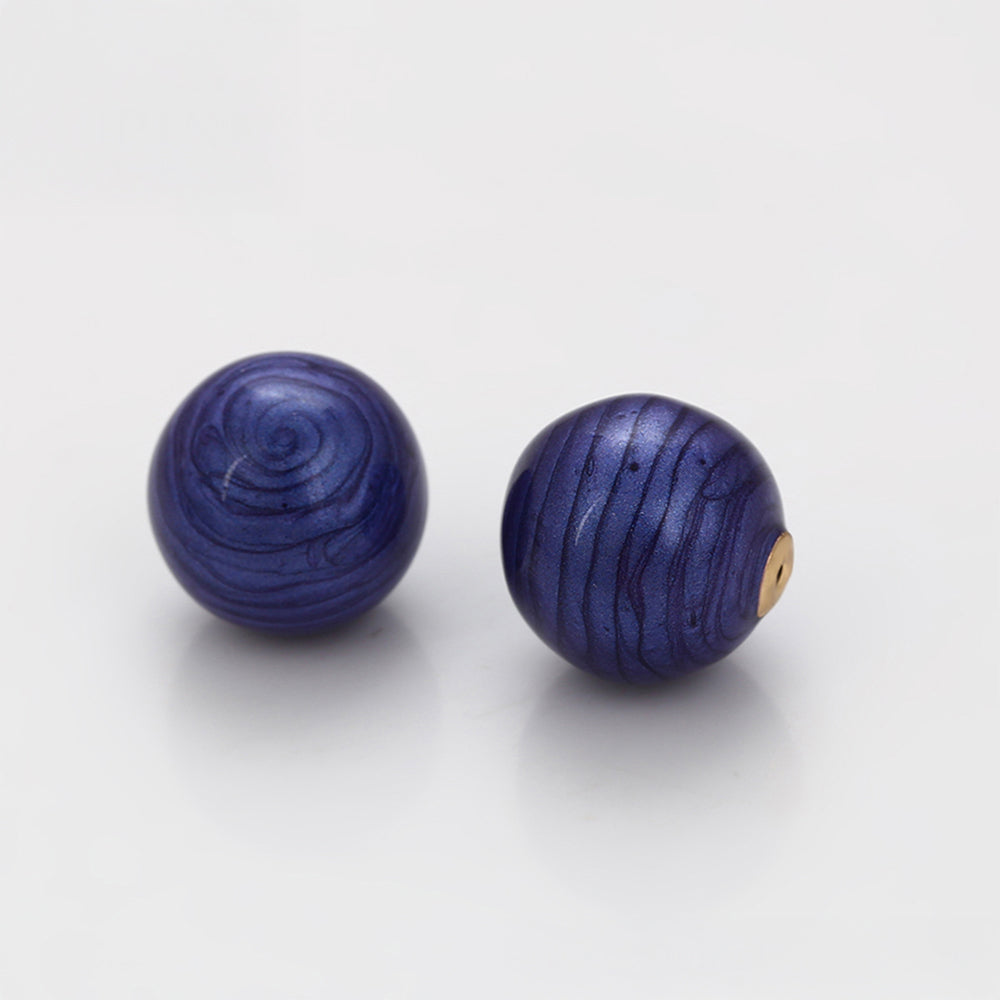 Amulet pozłacany z niebieskim kryształem emporia®