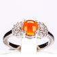 Pierścionek ze srebra próby 925 z pomarańczowym opalem i białym topazem