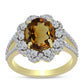 Pierścionek srebrny pozłacany z koniakowym kwarcem i białym topazem