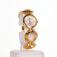 AW Gold Color damski zegarek ze stopu metali lekkich z niekończącym się paskiem z symbolem i 4 kryształami kwarcu