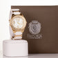 CUSSI Złoto-biały damski zegarek ze stopu metali z kolorowym paskiem i kryształkami kwarcu wokół tarczy